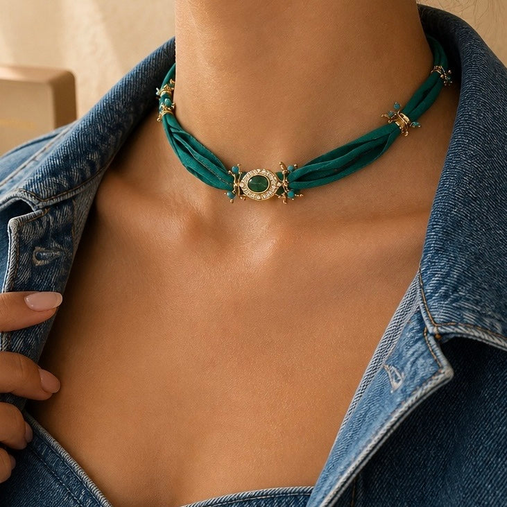 green necklace with a denim jacket. Solelle, Bohm Paris. Yerevan, Armenia
